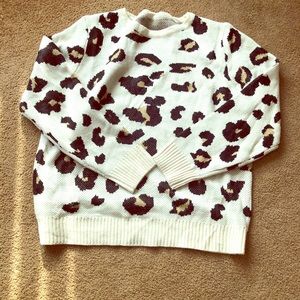 New sweater with leopard print.